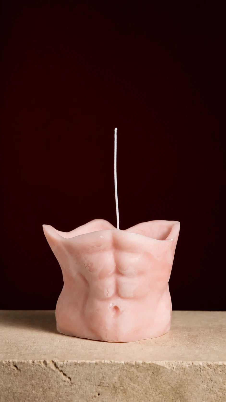Hermes, a blush torso candle