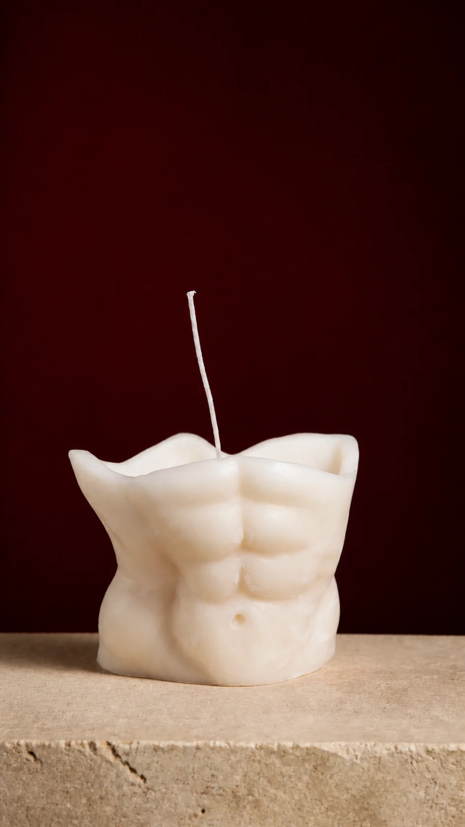 Telemachus, a cream torso candle